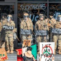 National Guard troops stand guard at a building on June 9, 2025 amid immigration protests in Los Angeles. (Photo: Michael Nigro/Sipa USA via AP Images)